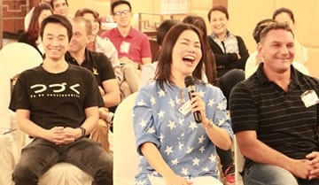 Image of a woman in an NLP Top Coach course.