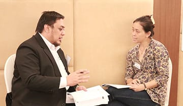 Image of Sebastien Leblond working with students.