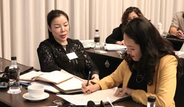 Image of students in an NLP Top Coach seminar.