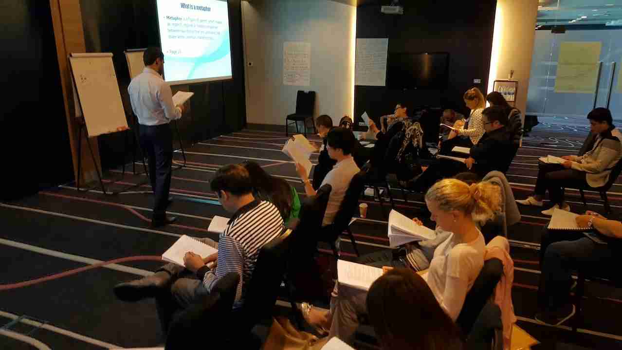 Students during a hypnotherapy training course learning new techniques.