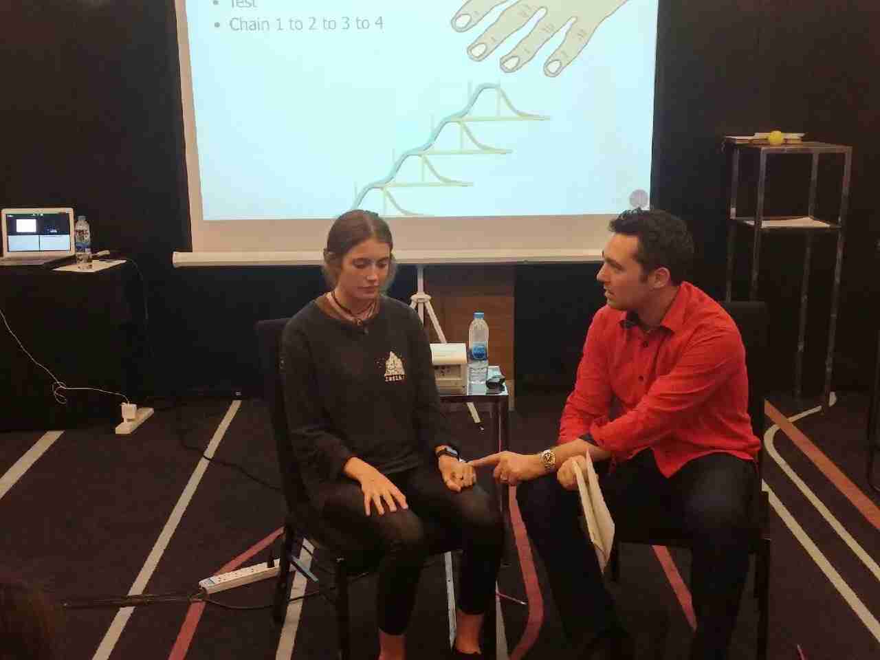 Sebastien Leblond working with an NLP Top Coach trainee to learn how to use hypnosis in their NLP practice.